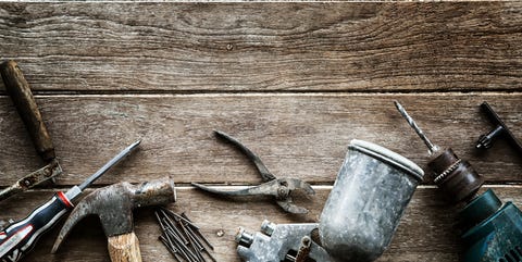 directly above shot of various work tools on table royalty free image 953143716 1546445457