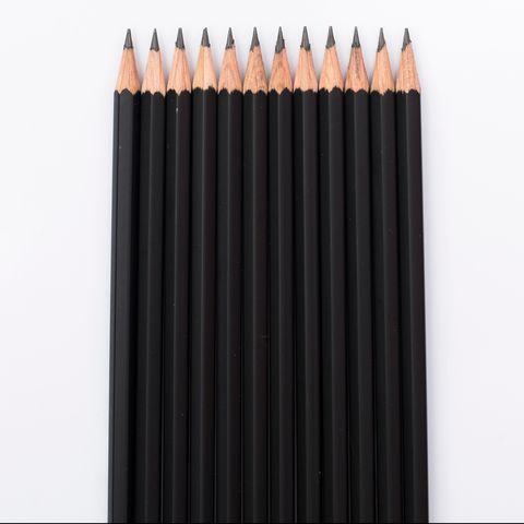 Directly Above View Of Black Pencils On White Background
