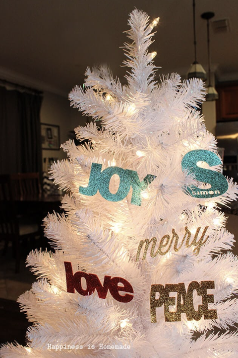 diy christmas ornaments made of glitter words on a white tree