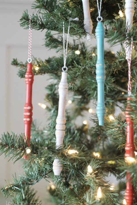 diy christmas ornaments, colorful spindle ornaments hanging on tree