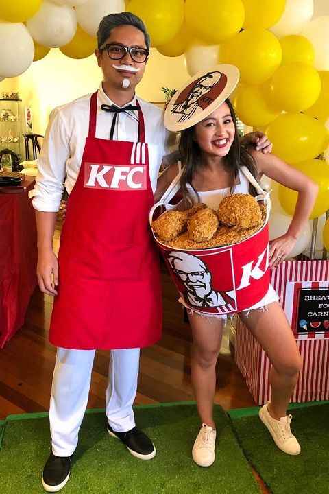 diy couples costume with fried chicken and colonel sanders wearing red kfc apron, western tie, white mustache and goatee