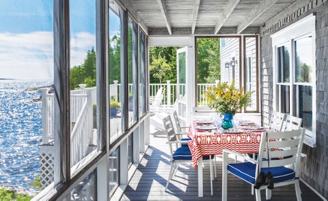 screened in porch with ocean view