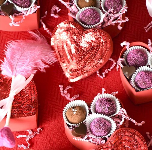diy valentine gifts, chocolate heart boxes and treat bags with pink mini shovels