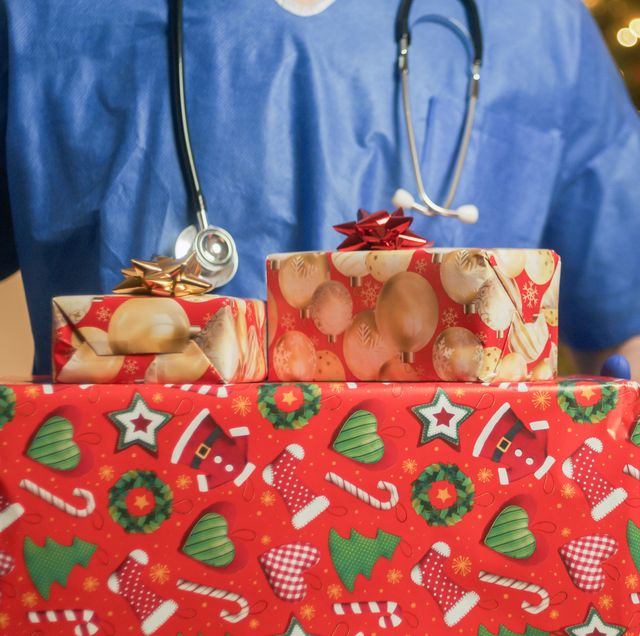 doctor with christmas gifts box