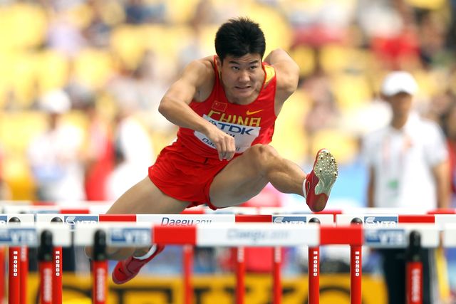 shi dongpeng, un atleta que no tenía la edad que debía cuando ganó la plata en el mundial sub20 de 2002