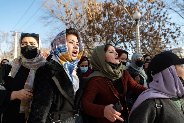 kabul, afghanistan december 22 afghan women protest against new taliban ban on women accessing university education on december 22, 2022 in kabul, afghanistan a group of afghan women rallied in kabul against a governmental order banning women from universities armed guards barred women from accessing university sites since the suspension was announced on december 20 photo by stringergetty images
