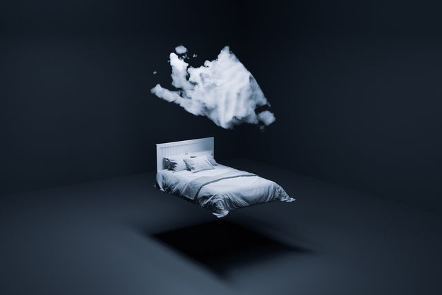 digitally generated image of a floating white bed and cloud in a dark grey room