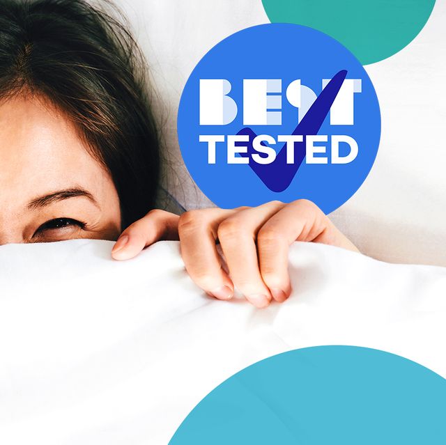 best tested badge and woman pulling down comforter up over her face