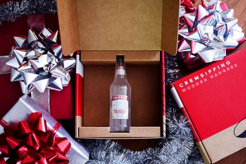 Present, Gift wrapping, Bottle, Drink, Material property, Wine bottle, Christmas eve, Distilled beverage, Plant, Packaging and labeling, 