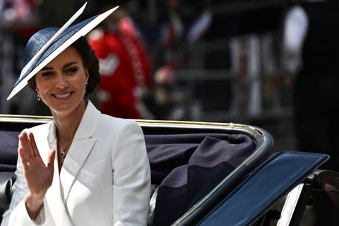 britains catherine, duchess of cambridge waves to the public as she arrives on a carriage to attend the queens birthday parade, the trooping the colour, as part of queen elizabeth iis platinum jubilee celebrations, in london on june 2, 2022   huge crowds converged on central london in bright sunshine on thursday for the start of four days of public events to mark queen elizabeth iis historic platinum jubilee, in what could be the last major public event of her long reign photo by ben stansall  afp photo by ben stansallafp via getty images