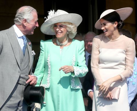 Meghan Markle with Prince Charles and Camilla Parker Bowles