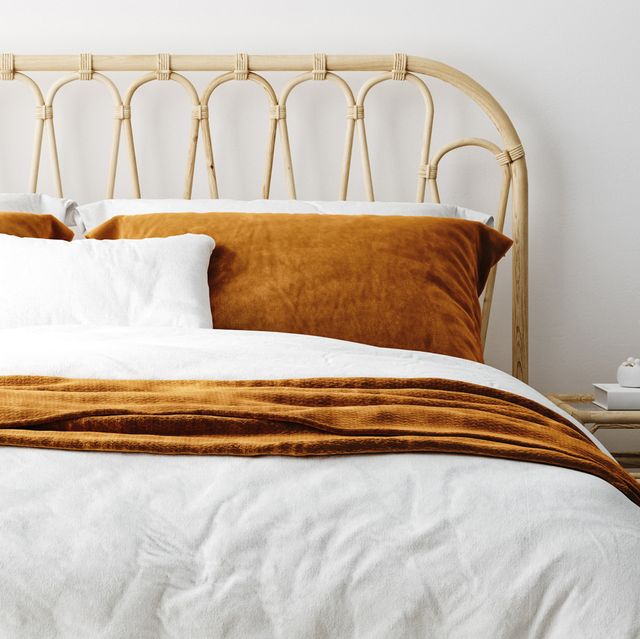 white and terracotta linen duvet cover on stylish bed