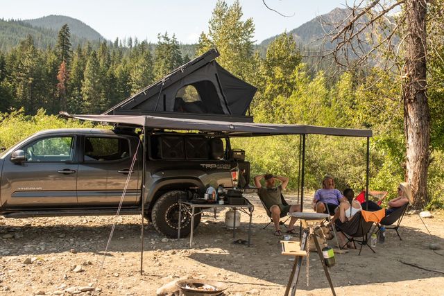 ikamper rooftop tent and awning at a camp site