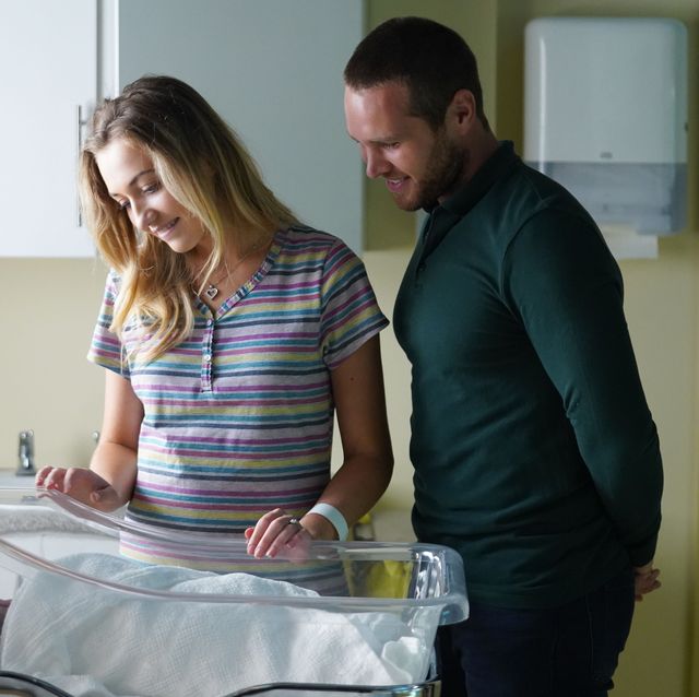 Louise Mitchell and Keanu Taylor with the baby in EastEnders