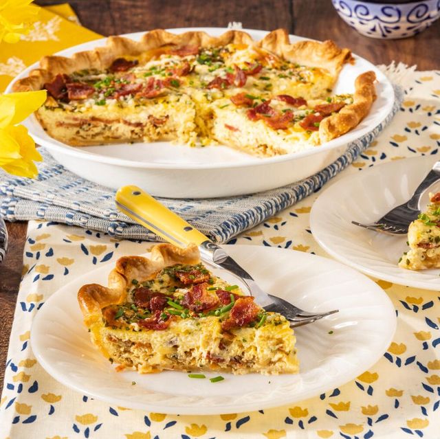 quiche on white plate yellow fork