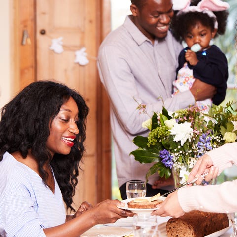Family and friends eating their easter meal. easter prayers family friends eating easter meal easter tradition