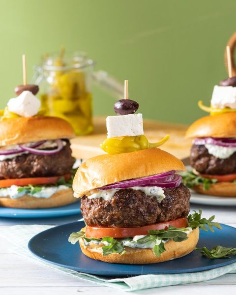 lamb burgers on bun with feta and olive on toothpick