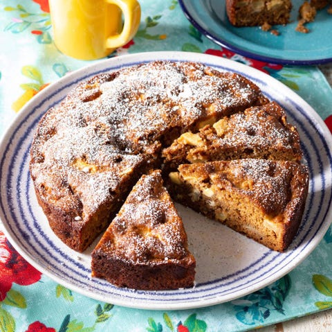 apple cake on white plate with blue stripes