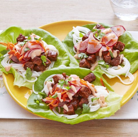 pork banh mi lettuce wraps on yellow plate