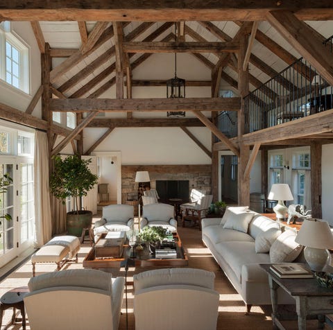 living room with high wood beamed ceiling