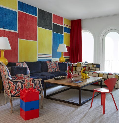 Living room, Room, Furniture, Interior design, Red, Yellow, Coffee table, Blue, Table, Wall, 