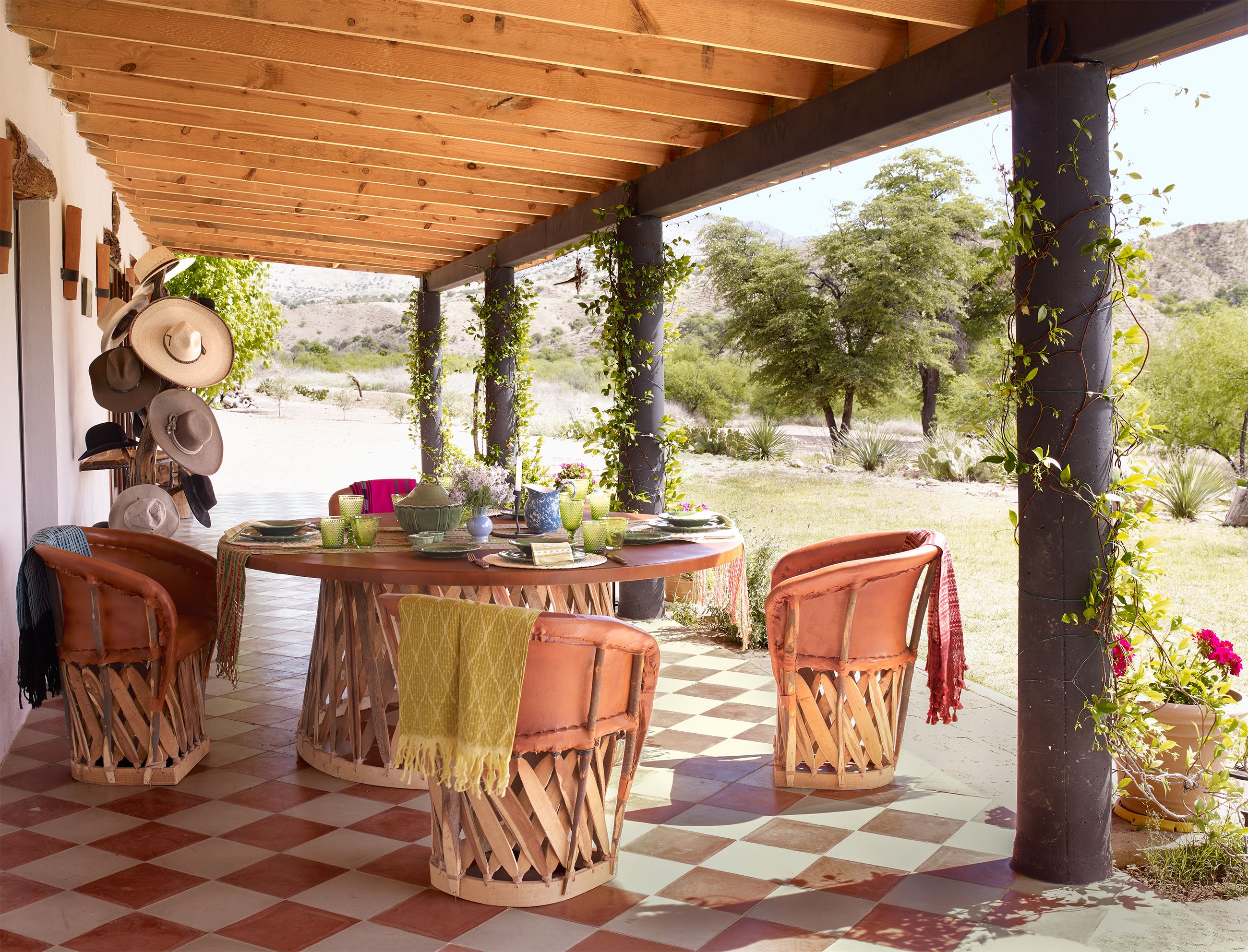 small outdoor table and chairs with umbrella