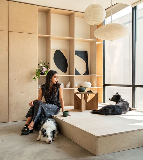 designer seated in living area