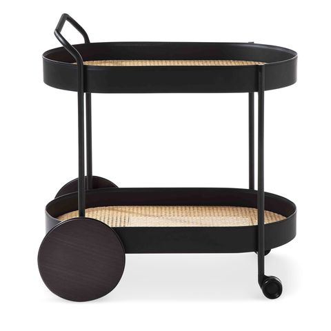 black wooden bar cart with large back wheels top and bottom oval trays with rattan bottoms