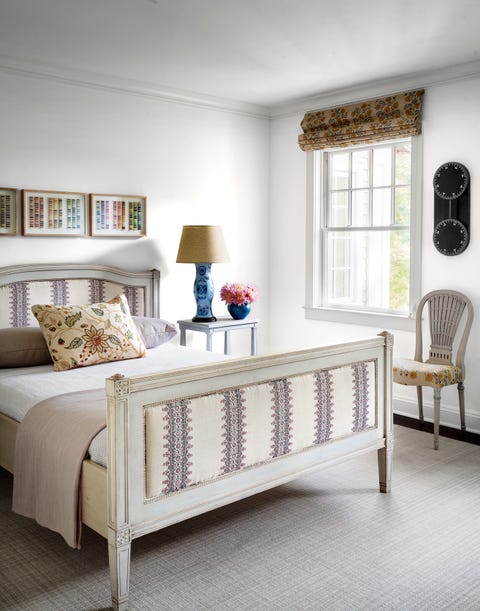 James Huniford - ELLE Decor james huniford white bedroom with bed with embroidered headboard and footboard