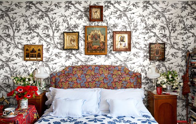 bedroom with patterned paper behind it on the wall