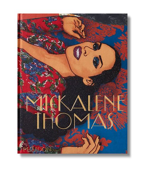 book cover with blue and red tones and a woman of color looking out from it and the title mickalene thomas on it