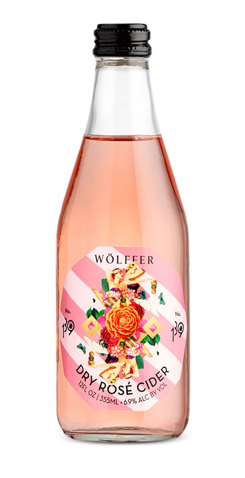 beautiful bottle with a pink dry rosé cide and a label with pink and white stripes