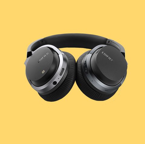 Headphones, Gadget, Audio equipment, Headset, Product, Yellow, Electronic device, Technology, Personal protective equipment, Peripheral, 