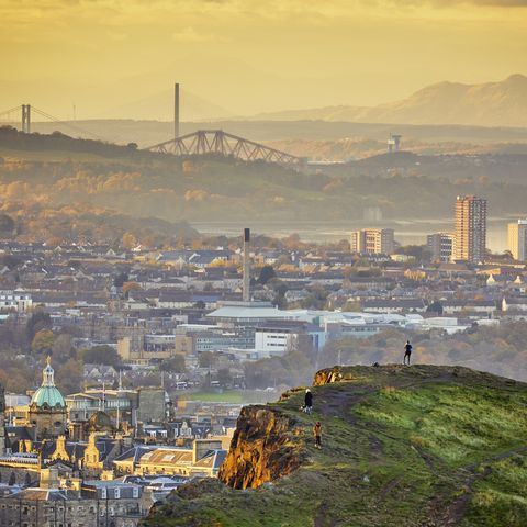Edinburgh cityscape and skyline with Firth of Forth at sunset from Holyrood Park