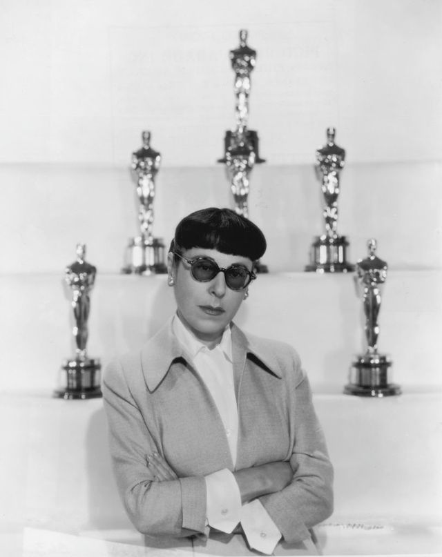 circa 1955  portrait of hollywood fashion designer edith head 1897   1981 posing with six of her oscars for costume design head was fashion chief at paramount pictures she wears her trademark dark, round rimmed sunglasses  photo by hulton archivegetty images