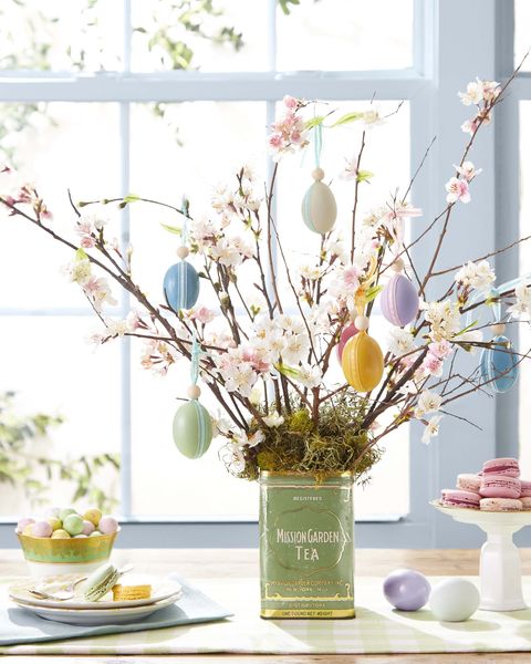 easter eggs hanging from flower branches