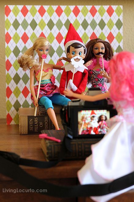 elf on the shelf with barbie dolls