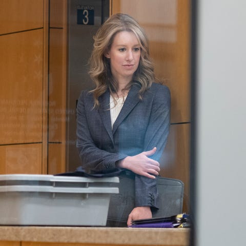 Elizabeth Holmes Theranos Court Hearing elizabeth holmes wearing a grey suit at a cali court hearing