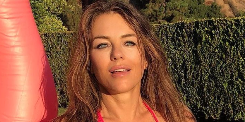 At 56, Elizabeth Hurley Shows off Toned Abs While Wearing a Bright Pink Bikini in New Instagram Post
