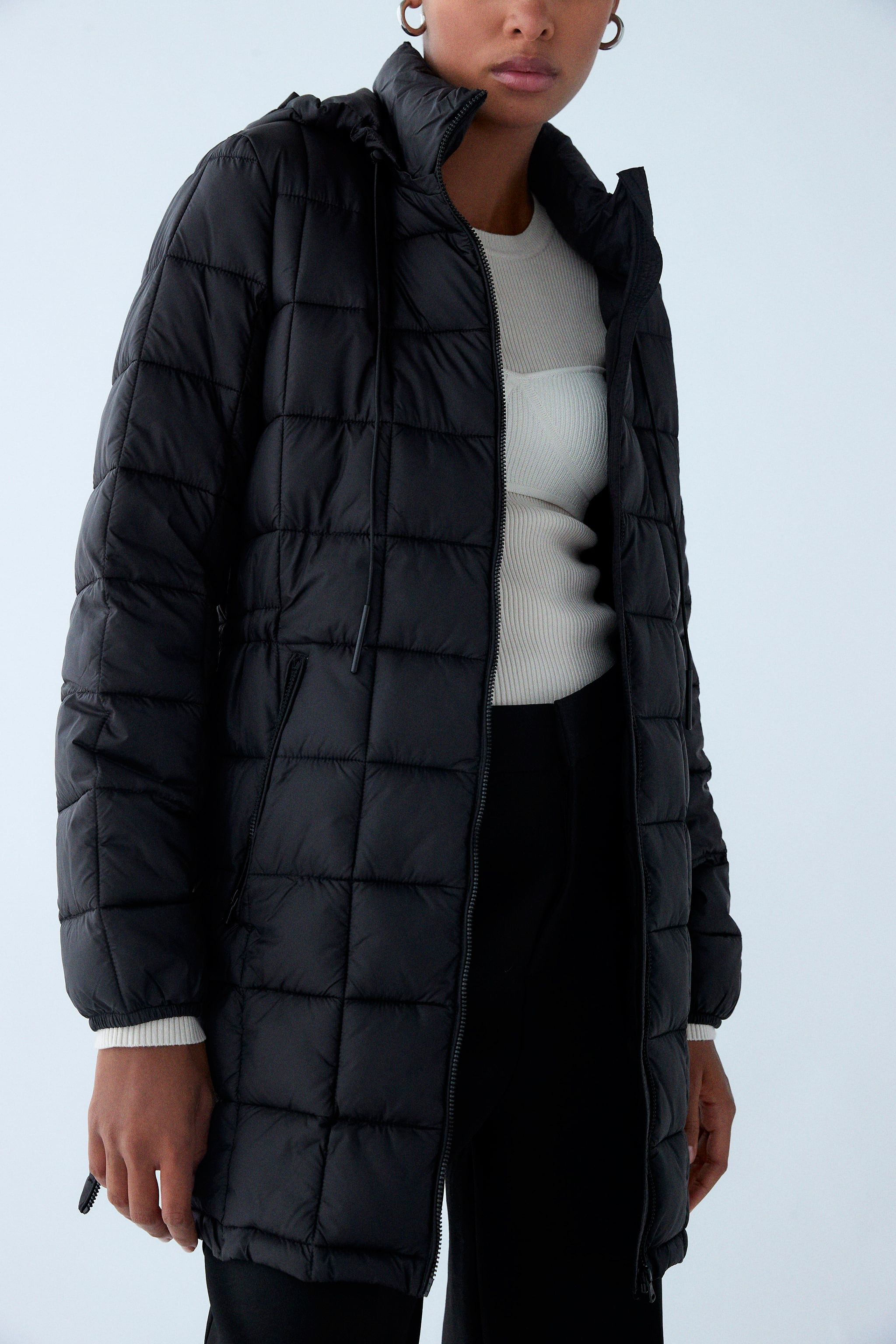 Corbata esposas transmisión El abrigo plumífero negro sostenible de Zara que arrasa en ventas