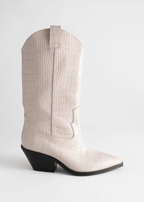 Botas blancas de tendencia con cordones, cowboy y altas Botas blancas de tendencia con cordones, cowboy y altas