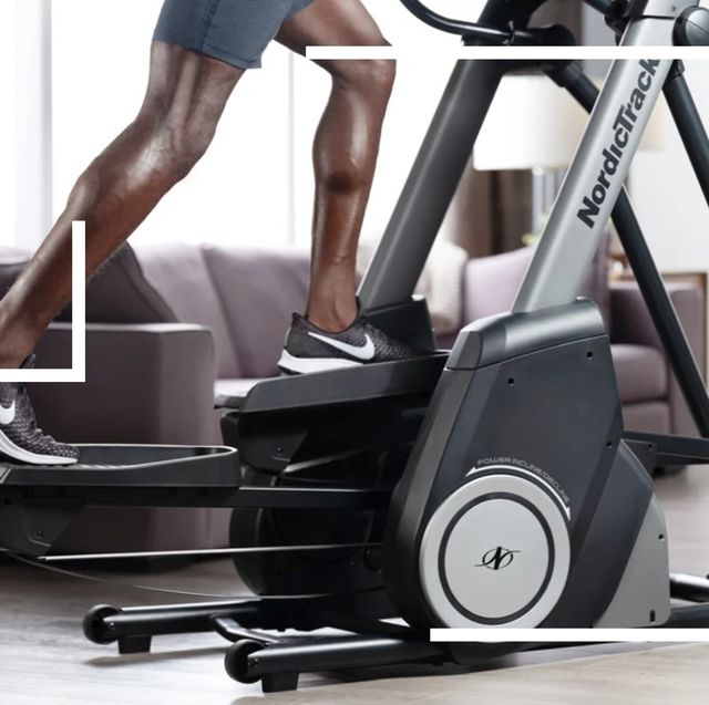 person using nordictrack elliptical machine in living room