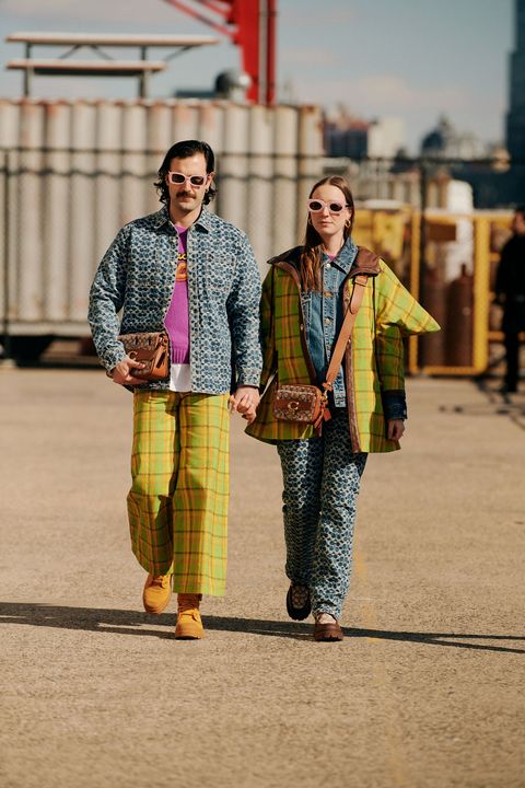 a man and woman in coordinating patterned looks