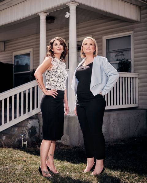 angie henderson and megan lundstrom stand outside the former site of the avery center, a sex trafficking research and support services nonprofit born out of their work