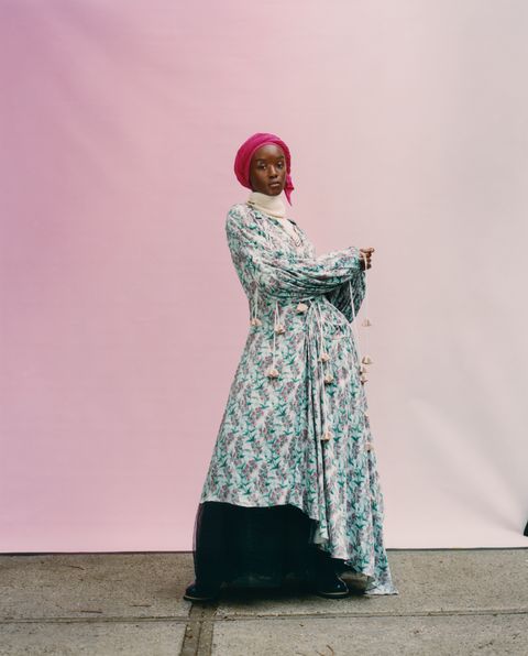 model in floral dress and pink hijab