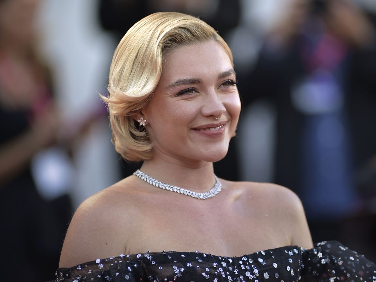 Florence Pugh debuts short dark hair in her newest film role