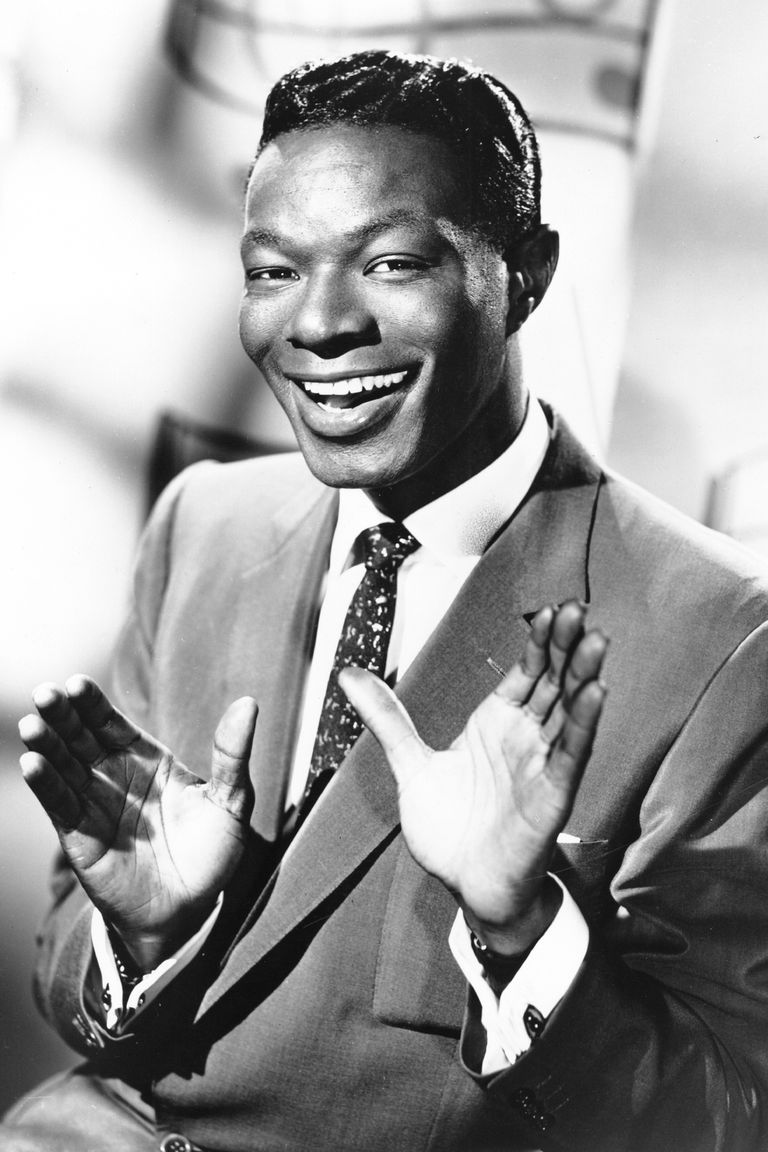 https://hips.hearstapps.com/hmg-prod.s3.amazonaws.com/images/entertainer-nat-king-cole-poses-for-a-portrait-in-circa-news-photo-1611348455.?crop=0.81824xw:1xh;center,top&resize=768:*