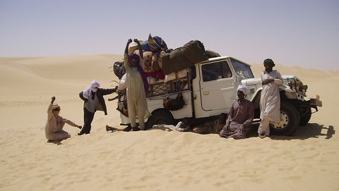 Desert, Natural environment, Sand, Sahara, Aeolian landform, Mode of transport, Motor vehicle, Erg, Landscape, Vehicle, 