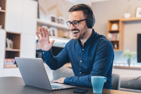 Business Video Conference handsome businessman having video conference at home
