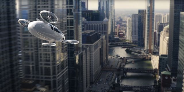 evtol electric vertical take off and landing aircraft flying through skyscrapers